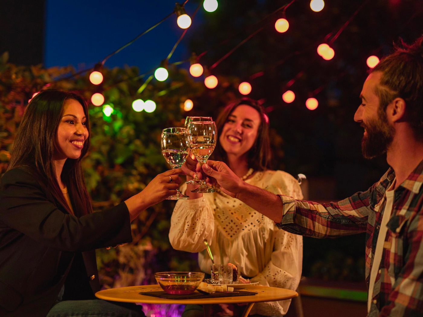 Transform outdoor summer spaces with creative color lighting